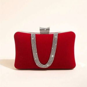 Small red clutch bag with rhinestone detailing.